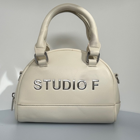 Studio F Handbags - Studio F Cream crossbody Bag